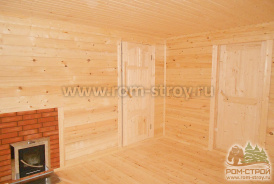 Интерьер брусовой бани 6х6, печь в парной, выносной бак