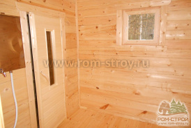 Интерьер брусовой бани 6х6, печь в парной, выносной бак